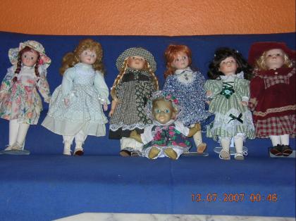 7 PUPPEN 30cm bis 40cm mit standfuss